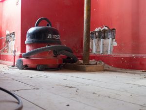 black and red vacuum cleaner