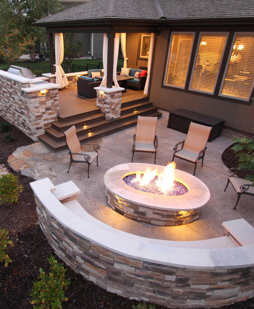 small backyard patio ideas with fire pit Leawood Deck with Patio